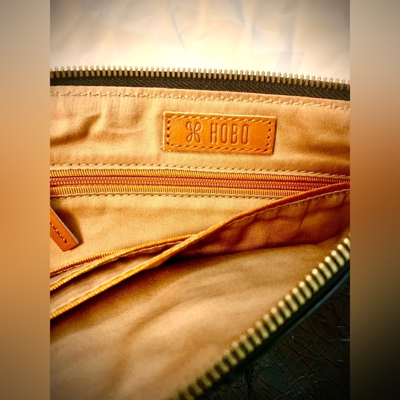 HOBO- sable wristlet in black polished leather. 
Measurements-10 x 6. Brand new - Picture 5 of 6